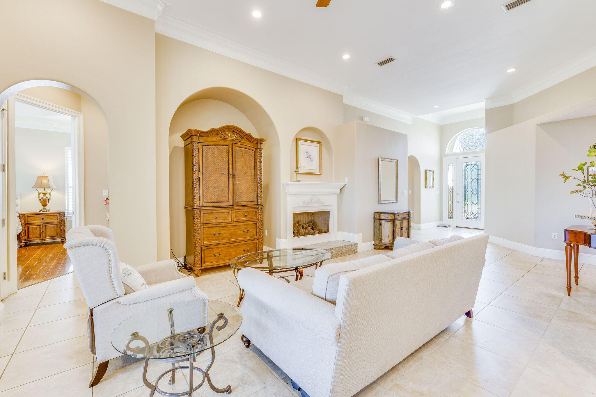 Embrace ownership of this unparalleled residence in Regatta Bay, offered at an unprecedented value. A true gem, this move-in-ready haven awaits your discovery. Don't miss the chance to call this meticulously maintained house your home--act swiftly before this extraordinary opportunity slips away. This three-bedroom, three-bath masterpiece in the coveted Regatta Bay community exudes opulence, with double master en suites and meticulously crafted triple Crown molding. The residence boasts a refreshed ambiance with newly painted walls and gleaming tile flooring. The enclosed glass patio transforms into an entertainment oasis, seamlessly blending indoor and outdoor spaces. The kitchen is a chef's dream, adorned with new appliances, a spacious island, and a generous pantry. The primary en suite is a sanctuary, featuring a Jacuzzi tub, a walk-in tiled shower, and expansive illuminated closets. For the car enthusiast or golf nut, the oversized two-car garage easily accommodates vehicles plus a golf cart, while the extended driveway provides additional parking space for guests. Whether you're seeking a permanent residence or a sophisticated second home, this Regatta Bay gem delivers upscale coastal living with all the amenities of this coveted community.  Beyond this exquisite home, the Regatta Bay lifestyle beckons, offering access to a world-class golf course, community pool, tennis and Pickleball courts, and a playground. Indulge in the convenience of the Legendary Marina just beyond the back gate, while a short golf cart ride leads to the vibrant Destin Commons for shopping, dining, and entertainment. Experience the prestige of this sought-after address at a remarkably approachable price point.
