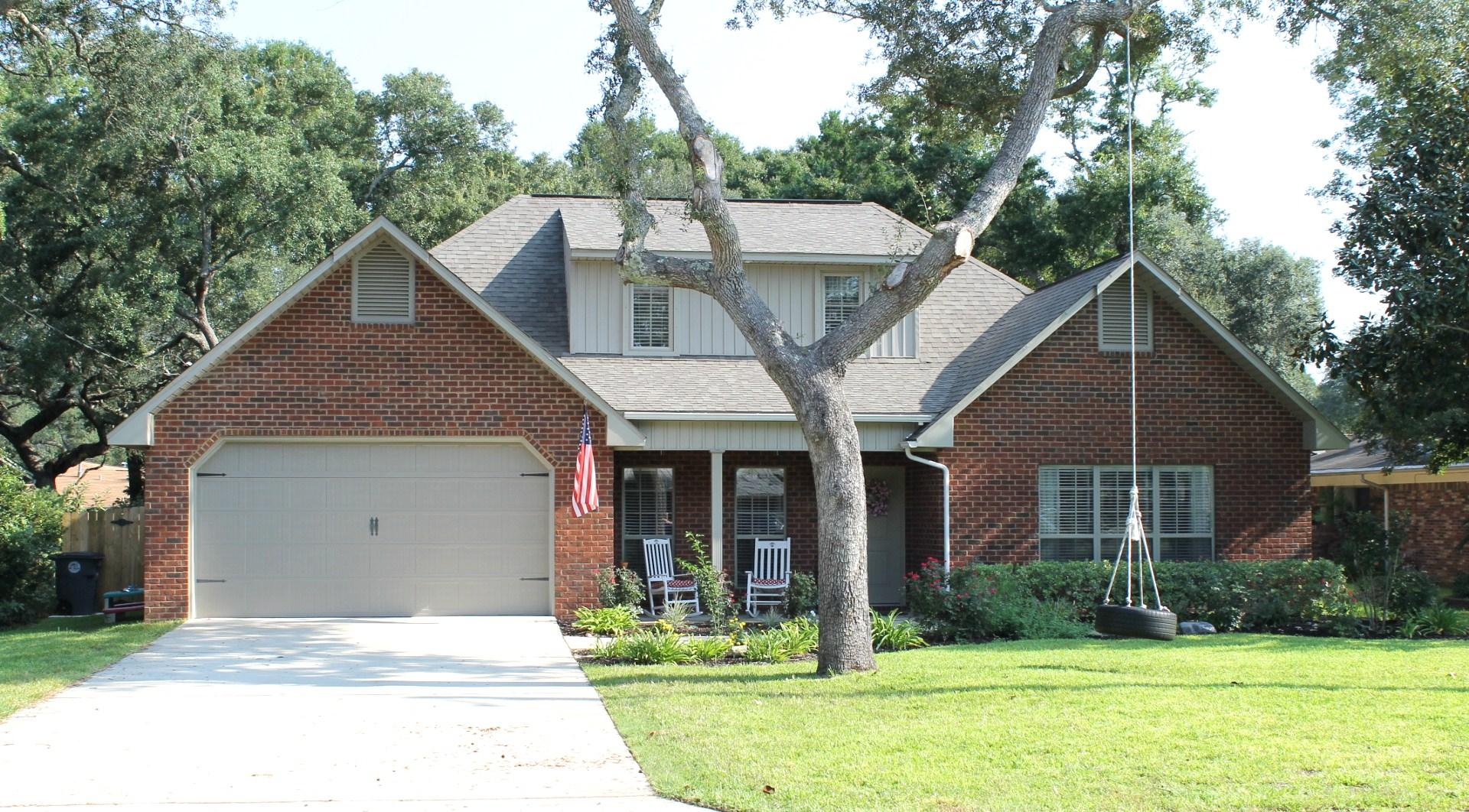 ** Owner will consider all reasonable offers!!** Exquisite four bedroom, three bath, two story, all brick house located on 1/4 acre and is conveniently located within a mile of Lewis School and the Eglin Air Force Base East gate. Located 1/2 mile from Florida Park which has a boat ramp, fishing pier, and playground. This home is complemented with a gourmet kitchen, granite counter tops, stainless appliances, rich wood laminate and tile flooring, formal dining room, gas fireplace, custom wine rack, front and back porches, separate laundry room and mature trees. Large downstairs master bedroom, walk in closet with custom shelving. Master bath has extra cabinet built-ins, double vanities, and a large walk-in granite shower with a separate soaking tub. This home is a must see!!