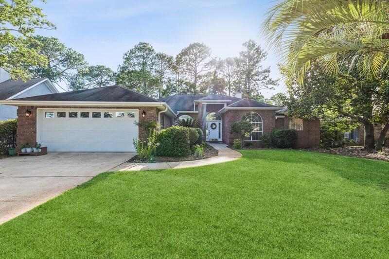 Beautiful golf course home in Bluewater Bay. Brand new architecutural shingled roof has been scheduled and will be put on in June. New carpeting in the bedrooms. This home has a nice large kitchen perfect for entertaining. Enjoy the golf course views from the large Florida room. The living room has a gas fireplace with built-ins, laminate flooring. The updated kitchen has stainless steel appliances and granite, lots of cabinet and counter space. The oversized garage has a side entry golfcart door. The master bedroom has trey ceilings and access to the Florida room. Just a short drive to the beaches of Destin, Eglin AFB, Duke Field and 7th Group. This home will not dissapoint, make your appointment to see it.