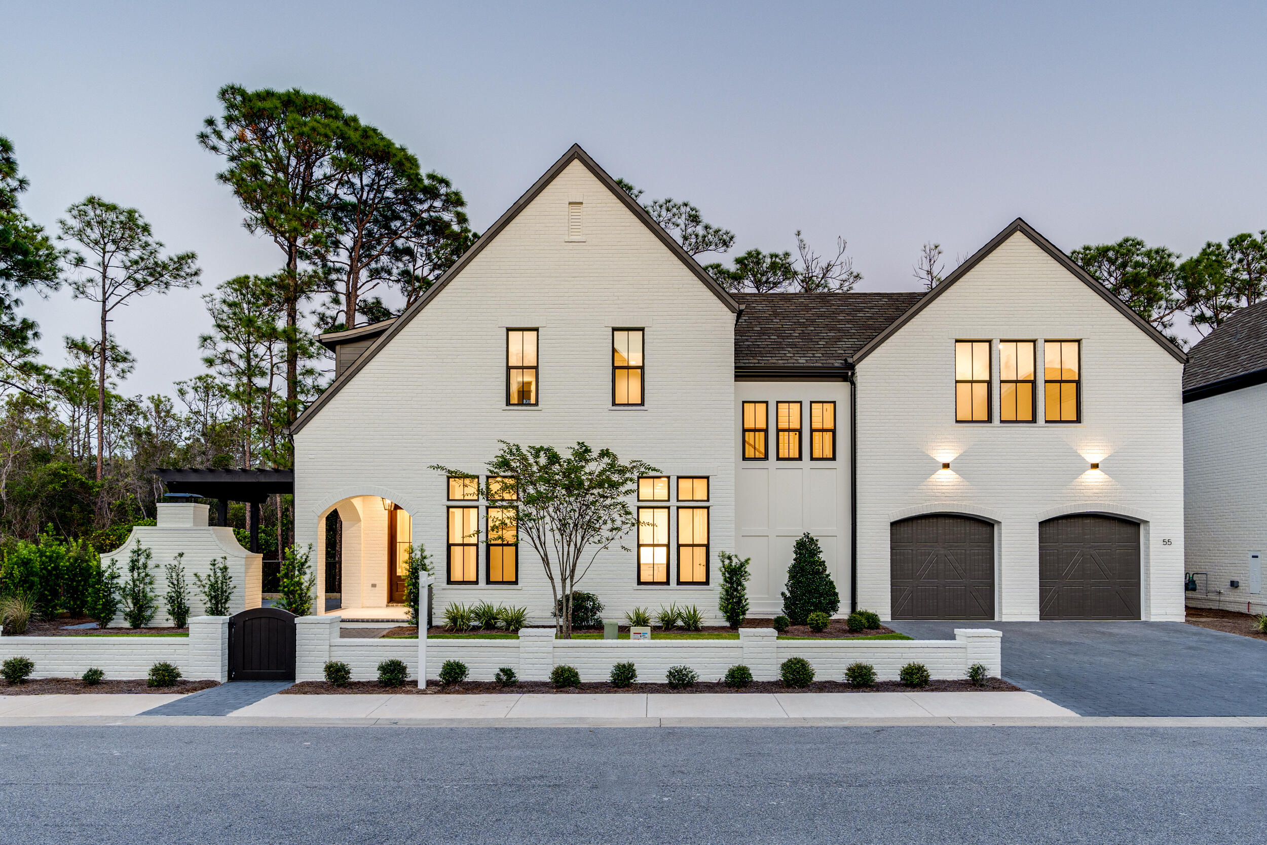 Welcome to your dream home in the coveted RidgeWalk community of Santa Rosa Beach! This stunning new construction at 386 RidgeWalk Circle offers the epitome of luxury living, with only four new homes left available.Nestled within this prestigious community, you'll enjoy not only luxurious living but also unparalleled convenience. RidgeWalk boasts close proximity to the pristine beaches of South Walton, with just a short stroll to the shoreline for days filled with sun, surf, and relaxation. Additionally, you'll find yourself within walking distance to the beloved shops and restaurants of Gulf Place, where you can indulge in coastal charm and culinary delights at your leisure. Step inside to discover the sought-after Burgundy floor plan, boasting a spacious layout with a convenient oversized 2-car garage. This home features 3 bedrooms, each with its own en suite bathroom, providing ultimate comfort and privacy for you and your family.
The heart of the home is the inviting living room, complete with a cozy linear fireplace adorned with a charming painted brick accent wall behind. Entertain guests in style in the gourmet kitchen, which showcases a large accent island, premium Woodharbor cabinets extending to the ceiling, and upgraded Cambria Berkshire Brass countertops. Admire the exquisite detail of the Duchess marble backsplash while cooking with top-of-the-line Fulgor Milano appliances, including a panel-ready refrigerator and freezer.
Adjacent to the kitchen, the bright dining room boasts a brick accent wall. From the kitchen you can seamlessly stroll to the covered porch with an outdoor kitchen, perfect for alfresco dining. Enjoy the paver patio and fenced backyard, ideal for relaxing or hosting gatherings with friends and family.
Upstairs, retreat to the luxurious primary suite featuring a vaulted ceiling with lap and gap white finish, cedar beam accent, and a custom walk-in closet by Tailored Living. Indulge in the spa-like primary bath, complete with dual sinks, a crushed stone tub, and stunning wooden-look 24x48 maple ribbon tile all on 3 walls.
The upstairs landing offers convenience with a wet bar including a sink and beverage fridge, making it effortless to enjoy your morning coffee or evening refreshments. Additional highlights include a spacious laundry room with ornate 9 x 9 tile and ample storage cabinets, designer lighting throughout, upgraded wood floors, and exquisite champagne bronze plumbing fixtures and door handles.
The RidgeWalk community provides the peace of mind of gated security and rental restrictions, ensuring a tranquil and exclusive living environment. Whether you're seeking a permanent residence or a vacation retreat, you'll appreciate the serene atmosphere and sense of community that RidgeWalk offers.
Don't miss the opportunity to experience the best of Santa Rosa Beach living in this exquisite home. Schedule your showing today and discover the ultimate blend of luxury, convenience, and coastal charm at 386 RidgeWalk Circle.
