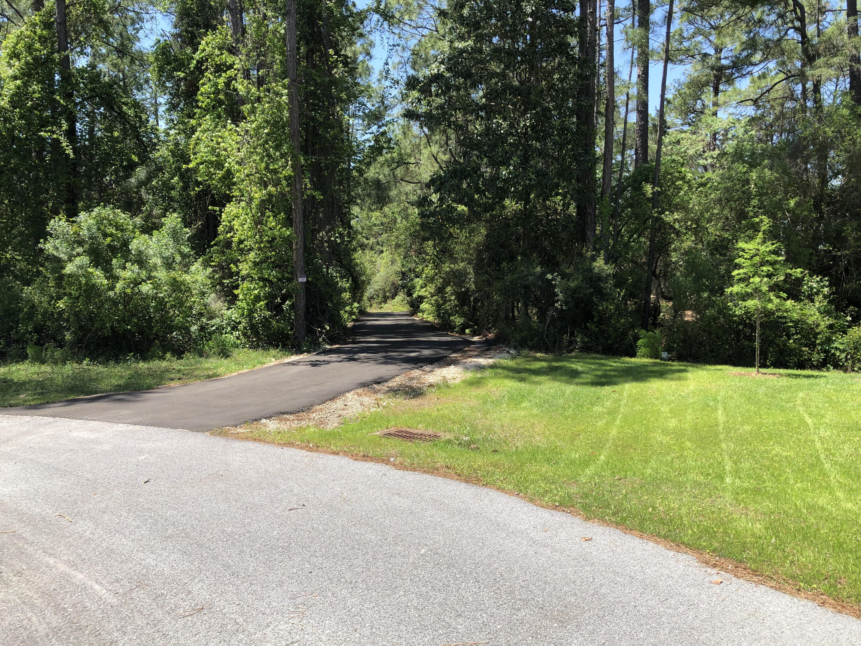 Beautiful Lot backs up to State Forest in Blue Mtn Beach. Experience the 30a lifestyle with privacy. Convenient access to beaches. No buildout time or HOA's. Enjoy walking and bike trails just steps away. All utilities available. Small strip of wetlands on eastern property line and lies both in an X & A flood plain. Adjacent property available to create a 1/2-acre estate size lot if interested.