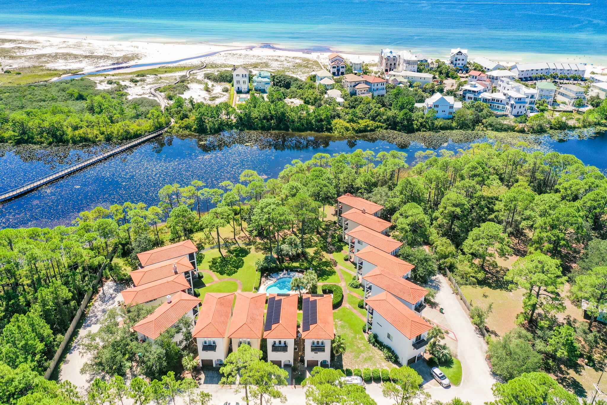 ''68 Maralago'' (Sea-to-Lake in Spanish) is a newly remodeled home south of 30A in Seagrove Beach. This lakefront community has a total of 14 Mediterranean Villas centered around the Nature Preserve and Tresca Lake, with top levels captivating on the gorgeous gulf and lake views through the tree canopies.Upon entering, you are greeted with a tasteful color palette, tall ceilings and a first-floor suite complete with an en-suite, a private terrace, and a wet-bar. The main living areas offers an open floor concept flooded with natural light and lake views. The newly upgraded kitchen is accessorized with gorgeous quartz countertops, amble cabinet space, a breakfast bar, and a stainless-steel appliance suite.