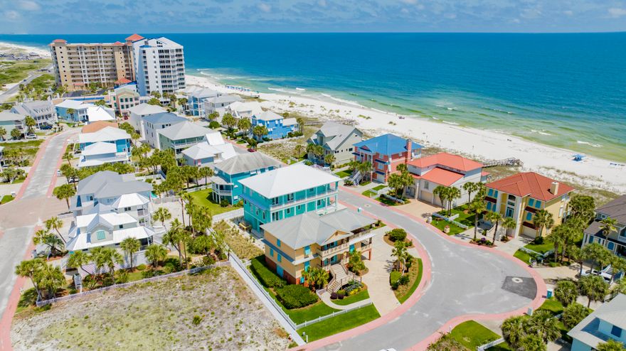 Here it is--your rare chance to own a true beach home in the exclusive, gated, rent-restricted community of Parasol, offering over 900' of private, sugar-white beachfront. This furnished 4-bedroom, 4.5-bath residence sits on a generous corner lot designed to showcase Gulf views & capture the essence of coastal living. Expansive balconies & deep, covered porches invite you to unwind, dine outdoors, or simply listen to the waves roll in--this is living at its finest. Step inside to find each level--accessible by ELEVATOR--offering its own living quarters, making everyday life or hosting guests a breeze. The main floor is light-filled with fresh paint, soaring coffered ceilings, travertine floors with hardwood accents, & a seamless flow that connects the indoors to the Gulf beyond. The coastal-i