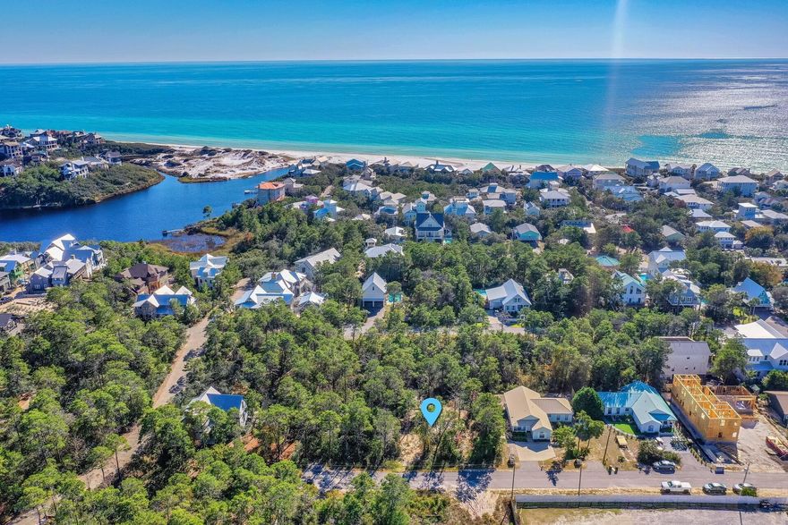 Views of Draper lake and gulf are possible from second and third floor. This lot is on desirable west end and south of 30A in Gulfview Heights. Taps are paid, water meter in and power pole in ready to build. No HOA and quiet location at end of street. Make offer!