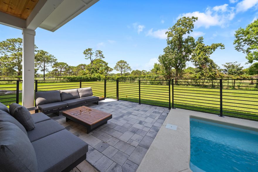 This NEW CONSTRUCTION HOME is furnished, available NOW and ready to begin enjoying the beach! Introducing BelMar, the NEWEST premier luxury gated community in Panama City Beach, perfect for short-term rental investments. This newly constructed, furnished home is ready for immediate purchase, offering a seamless blend of modern innovation and coastal living. Located just half a mile from the beach, BelMar is a low density community with golf course views designed to maximize rental returns, with projections ranging from $120,000 to $155,000 annually. BelMar features 22 single-family homes, including ''The Gulf,'' a stunning 3-story residence with an elevator, 5 bedrooms, 4.5 bathrooms, and a private pool with a waterfall. This home boasts a modern European design, complete with a stone fireplace, custom cabinetry, 10' ceilings and modern luxuries. The interiors are bright and airy, featuring a mix of white and black blended with rich wood textures, creating a luxurious hotel-style retreat. Step through the remarkable pivoting front wooden door into a modern, open space that seamlessly connects the living, dining, and kitchen areas. The gourmet kitchen is equipped with GE Caf?? professional appliances, a natural gas range, and waterfall quartz countertops. The open-concept living area includes a stone linear fireplace and built-ins, while the dining room is provides ample seating. The rear porch provides access to the private pool and offers beautiful views of Signal Hill golf course. The main level also includes a carport and owner's closet for convenience. You'll love to spacious 5' wide stairwells and the residential elevator in this 3-story home. 

On the upper levels, you'll find a wet bar on each floor giving convenient access for guests and owners alike for beverages any time. On the second level, there are spacious bedrooms, a Jack and Jill bath, and built-in bunk beds. The upper level features an oversized primary suite with a spa-like bath, soaking tub, large walk-in closet, and private patio access. Enjoy the expansive rear balcony overlooking the pool and waterfall, making this primary suite a true retreat. 

The home offers ample storage, multiple covered porches, and is designed with multi-generational families in mind. BelMar is not just a home; it's a lifestyle. Enjoy being walking distance to the beach, miniature golf, a fun human size maze, 18-hole golf course, tons of restaurants and local attractions that you can enjoy year round. The beach has many public accesses and also Rick Seltzer park which give ample opportunity to find your toes in the sand and watch sunsets nightly! 

Additional luxury features include a private EV-charging station in the carport, cabinet backlighting, shower niche backlighting, quick-tie cable systems rated for 215 mph winds, sprayfoam insulation throughout, tankless water heater and floating bath vanities. The HOA maintains all grounds and includes private pool cleaning, as well, for a low $450/quarter fee. This low quarterly fee is IDEAL for investment properties to keep cost of ownership low. 

Invest in this modern, coastal community and enjoy the dual benefits of a lucrative rental property and a luxurious second home at the beach! With 22 homes total, you can also choose your own homesite and enjoy a new home in 6-7 months! Inquire today regarding this MOVE-IN READY home or the opportunity to start building now!