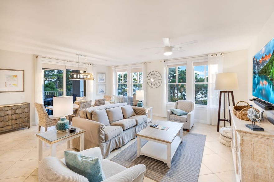 Located on the 4th floor of Bahia, this bayfront end unit offers sweeping water views from nearly every room. Featuring 3 bedrooms & a spacious split open-concept design, the floor plan is ideal for hosting family or guests. The entry opens to a kitchen with a breakfast bar that flows seamlessly into the dining and living areas, where large windows bring in abundant natural light and frame the stunning bay vistas. Glass doors extend the living space onto a rounded balcony, creating the perfect setting for entertaining or simply enjoying the view. The 3rd bedroom is designed as a private studio with its own kitchenette, living space, full bath, and separate entrance, providing excellent flexibility for rental opportunities if desired. In addition, Hotel Effie is nearby with a rooftop pool and bar and fine dining at Ovide. Owners also have access to the private Solstice Club, an amenity for owners and their guests, featuring grills, screened porch with gas fireplace, indoor bar, flat screen TV and comfortable seating inside and out.
As an introduction to the Sandestin lifestyle, we invite our new owners to explore amenities that make Sandestin special. The listing brokerage and seller(s) are presenting the buyer(s) of this property with (2) 90-minute rounds of Tennis court time, a golf foursome at one of our three championship courses, and a round of golf for up to four (4) players at the unrivaled Burnt Pine Golf Club.
Sandestin Golf and Beach Resort features more than seven miles of beaches and pristine bay front, four championship golf courses, 15 world-class tennis courts, a 226-slip marina, a fitness center, spa and celebrity chef dining. Shop, dine and play at the charming pedestrian village, The Village of Baytowne Wharf and more. Inside the gates of the resort, residents enjoy a balanced lifestyle of high-class living, spanning the 2,400 acres from the beach to the bay. Everything within the gates of the resort is accessible by golf cart or bicycle. The entire resort is interconnected by miles of pedestrian, bike and golf cart paths that weave through groves of live oaks, meandering past natural lagoons, fountains, man-made lakes, and meticulously landscaped fairways.