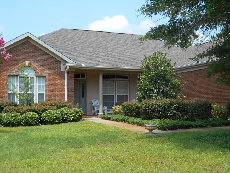 Lovely pond front home featuring granite counters, a gas fireplace, a large screened porch with brick pavers, upgraded media wiring, whirlpool tub and so much more. You will LOVE everything this four bedroom two bath home has to offer. Fully fenced back yard. Not to mention all the wonderful amenities of Hammock Bay.