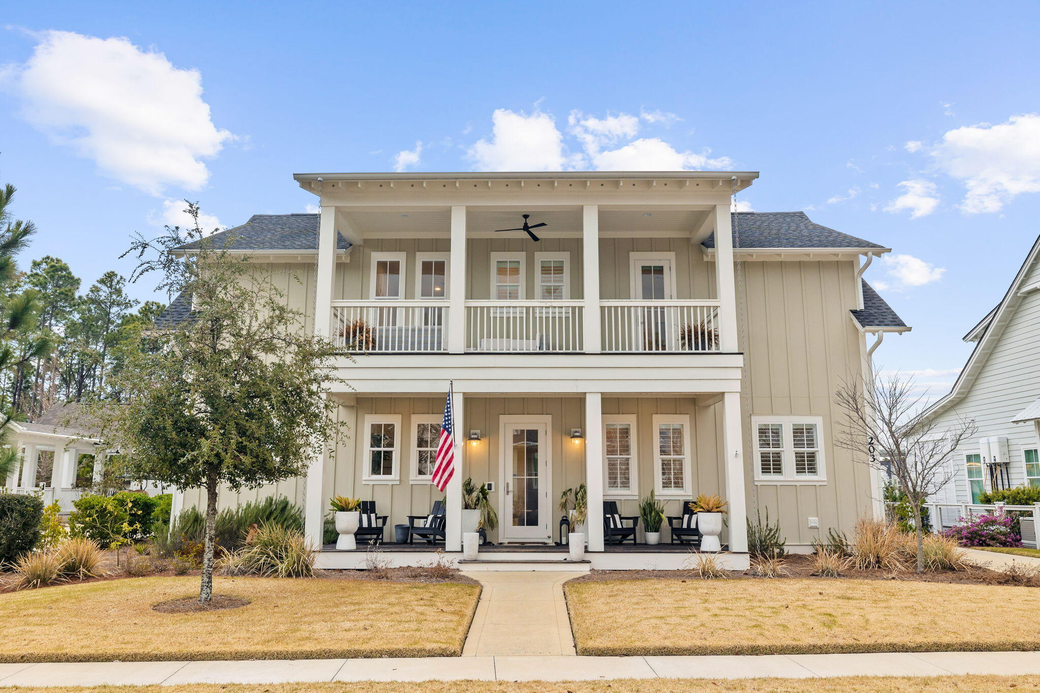 This custom built home sits on one of the most desirable streets in Origins. Over 1,000 sq. ft. of covered outdoor living area that backs to a beautiful pond and pine trees for ultimate privacy. This home features 10 ft. ceilings, hardwood floors throughout, open floor plan, professional grade stainless steel appliances and much more. On the first floor you'll find the owner's suite overlooking the pool, a screened in patio, plus a gorgeous large pavilion with fireplace. Master bath is equipped with dual vanity, garden tub, a separate shower and an expansive custom closet. Three upstairs bedrooms all have their own on-suite bath. The home has a complete home automation system; equipped with speakers throughout, cameras, and temperature control. The two car garage also has heat and air.