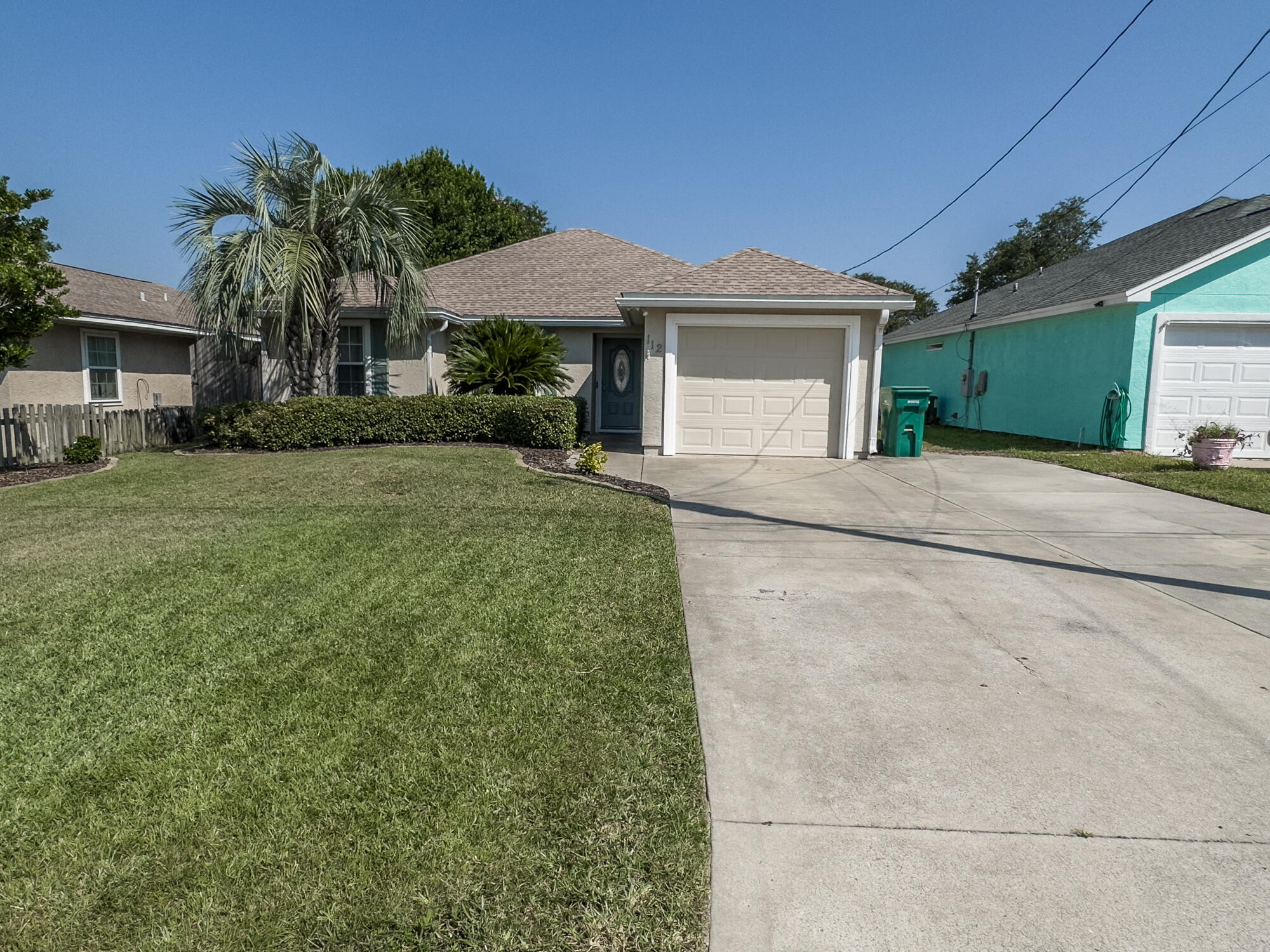 SHORT WALK TO THE BEACH!! This beautiful home with newer stainless steel appliances, quartz countertops, and beautiful flooring. Featuring 3 bedrooms, 2 bathrooms, 1 car garage and high vaulted ceilings. Roof was installed in 2018. Located just a few blocks to the beach and short distance to Pier Park! There is a large 15 x 12 screened in Lanai off the living room leading to the back yard with a shed for extra storage. Plenty of driveway parking. All dimensions are approx.