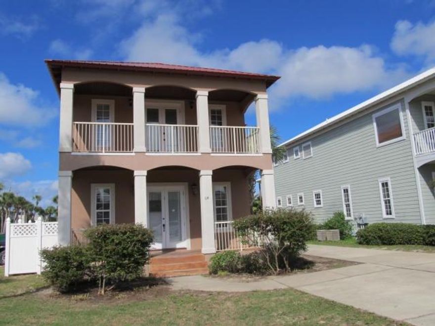 This 9 Bedroom / 5.5 Bath Beach Home complete with a beautiful 22x12 pool is located right across the from the most beautiful beach in the world. The main home features 10/9 foot ceilings, an oversized Great Room for the family to enjoy, the perfect Kitchen, a Guest Home that sleeps 16 by itself, adding to the total 30-36 Bedroom Capacity of this home. You can park 10 cars on this property. You can add another bath easily. This design would also be perfect for Weddings in the off season making it the ''Ultimate Year Round Rental Machine.'' The entire inside of the main home has been painted. Attributes are Travertine, Granite, Stainless Steel, Crown Molding, and a Separate Carriage House. This home also does not require flood insurance and is not in a Cobra Zone, and has Hard Stucco.