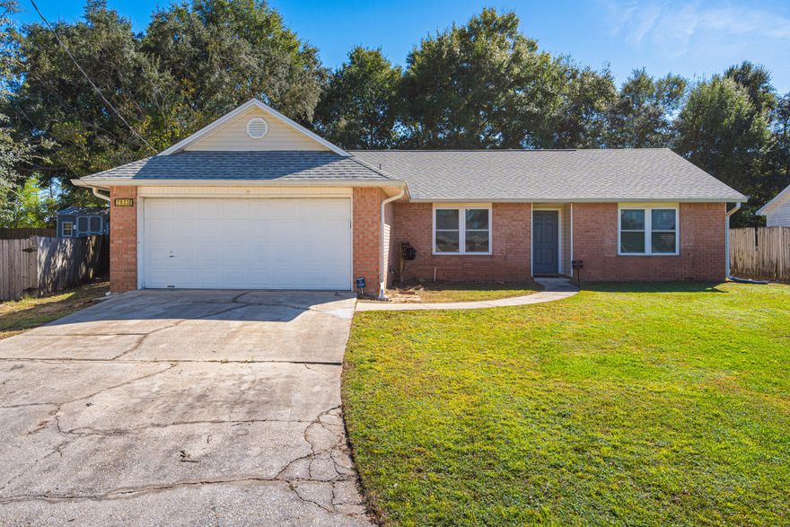 Welcome home to this well-maintained and upgraded 3-bedroom, 2-bath brick home in the heart of Navarre! With 1,600+ square feet of living space, this home blends classic charm with the comfort of modern updates. Now for the upgrades. All major systems have been updated(dates are below), the windows and backdoor have been replaced with hurricane-rated impact glass, no need to haul out the hurricane shutters, and the attic has been fully insulated. The R30 Batt insulation in the attic provides higher efficiency for all heating and cooling throughout. The insulation extends to the garage, which also includes a mini-split system installed in 2024 to provide a temperature-controlled space for projects, working out, or storage. The only thing left to do is move in! Inside, you'll find tall ceilings, recessed lighting, and a bright, open floor plan that makes the space feel instantly welcoming. The kitchen is fully equipped with stainless steel appliances and flows into the living and dining areas, perfect for hosting friends, family dinners, or game-day gatherings. 
Step outside to enjoy the spacious fenced backyard, complete with a new fire pit ready for evenings under the stars. The current owner had the septic system fully replaced, with the exception of the tank, in 2019 by JLG Septic and it now includes a ground-level clean out. 
Peace of mind comes easy with hurricane-rated windows (transferable warranty included) and major systems already updated: roof (2022), HVAC (2018), septic (2019), and water heater (2010).