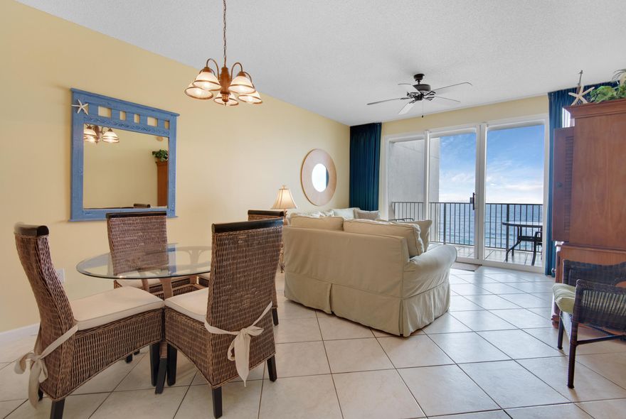 Enjoy waking up in the morning steps away from the sugar-white sand beaches of the Emerald Coast without the price tag of being Gulf-front  this lovely condo offers DIRECT GULF views from the living, kitchen, & dining areas, and is perfectly positioned on the 5th floor of the A building of Majestic Sun, which is securely tucked behind the private gates of Seascape Resort. This WELL-MAINTAINED and RENTAL READY west end condo makes the perfect second home or vacation rental property with a gross RENTAL PROJECTION of $54K+. The SPACIOUS balcony in the 12th stack makes the perfect serene setting with a nice breeze off the Gulf to catch breathtaking sunsets and direct Gulf views. The 12th stack is one of the few that allow privacy with no neighbor visible from the balcony on the left hand