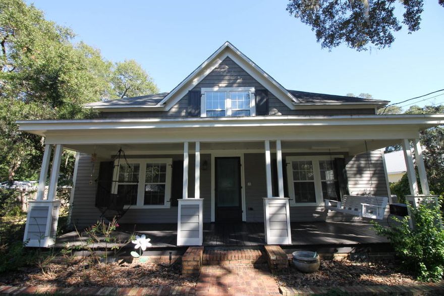 Stunning Restored Historic Victorian Home, available in Historic St. Andrews, This two story home is nestled under magnificent accent oaks trees. Home has 3 bedrooms and 3 bath rooms. This home has been entirely restored over the past 10 years. The first floor offers a kitchen that has custom cabinets, stainless steel appliances, granite counter tops and gas cooking. The home has original wood floors, spacious living area, dining area, office, master bedroom, laundry room and sunroom all on the ground level. Upstairs has a separate living space, and two large bedrooms and bathroom with an original claw foot tub. Most of the rooms have original tongue and groove wood ceilings. This home has a separated oversized two car garage with tons of storage and cabinets.