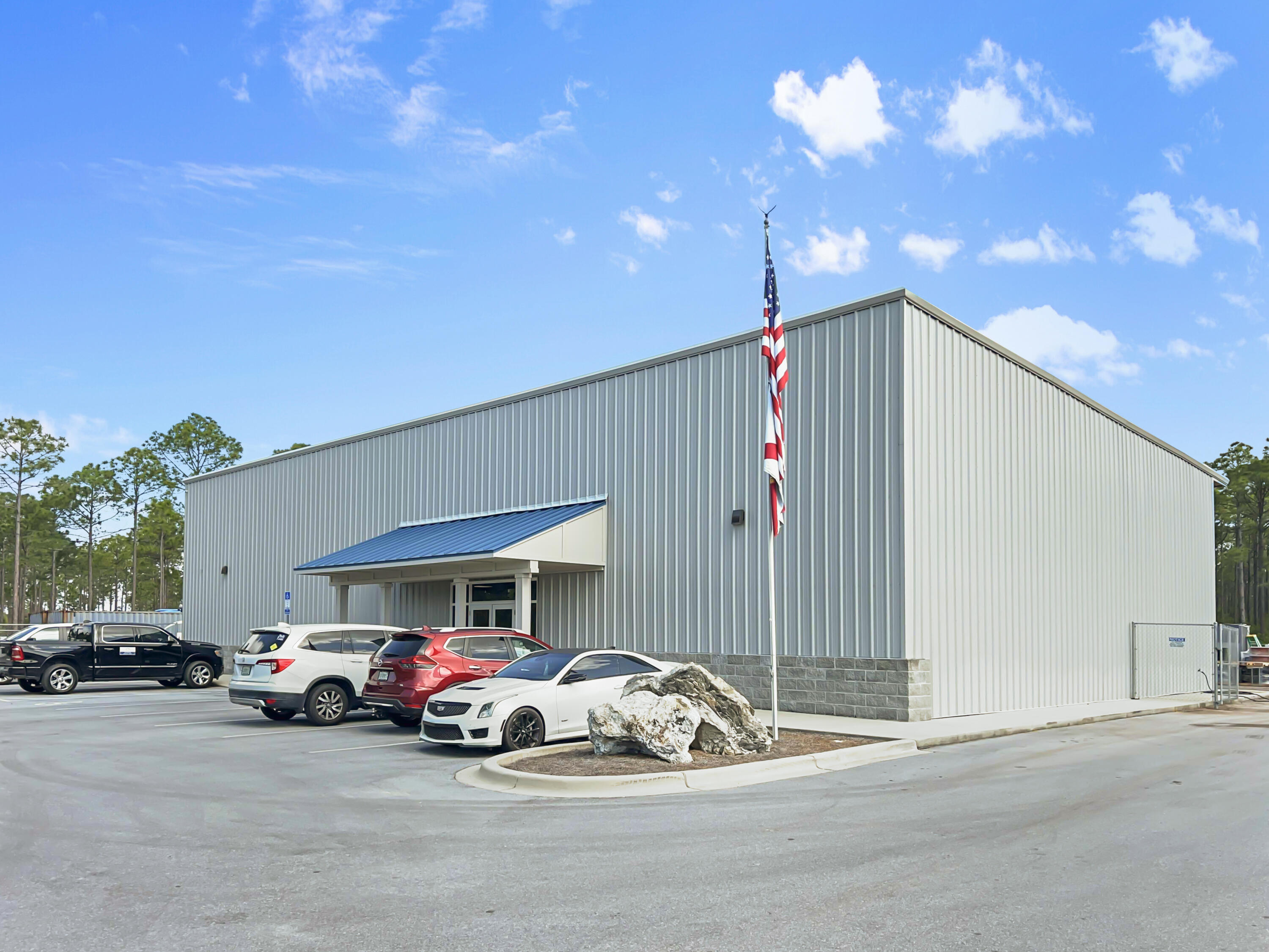 Fantastic 'flex' building for sale in Beach Commerce Park. Built in 2020. The 7,500 square foot building includes 3,000 square feet of quality office space on two floors. Warehouse space is on both sides of the offices. Huge conference room, 3 bathrooms, one includes a shower. 21' to 24' eave height. Three 12' x 14' grade-level rollup doors. Secure fenced yard space. 3-Phase, 400 Amp electrical service. The site is engineered to add an additional 2,000 square feet. The Civil and construction drawings are attached.