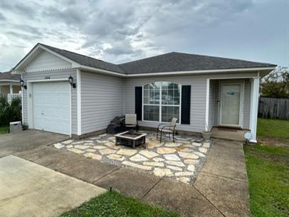 This lovely three bedrooms two bath home has vinyl flooring and tile throughout and is on SOLAR POWER SO YOUR UTILITIES WILL BE CONSIDERABLY LOWER. This house has a nice open floor plan and has plenty of space for all your needs. You can relax during the evenings on the covered patio located out back or kick back and enjoy a relaxing fire at night. To view, contact Navarre Beach Realty at 850-936-0700. The property is currently occupied, but will be ready by Thanksgiving weekend.