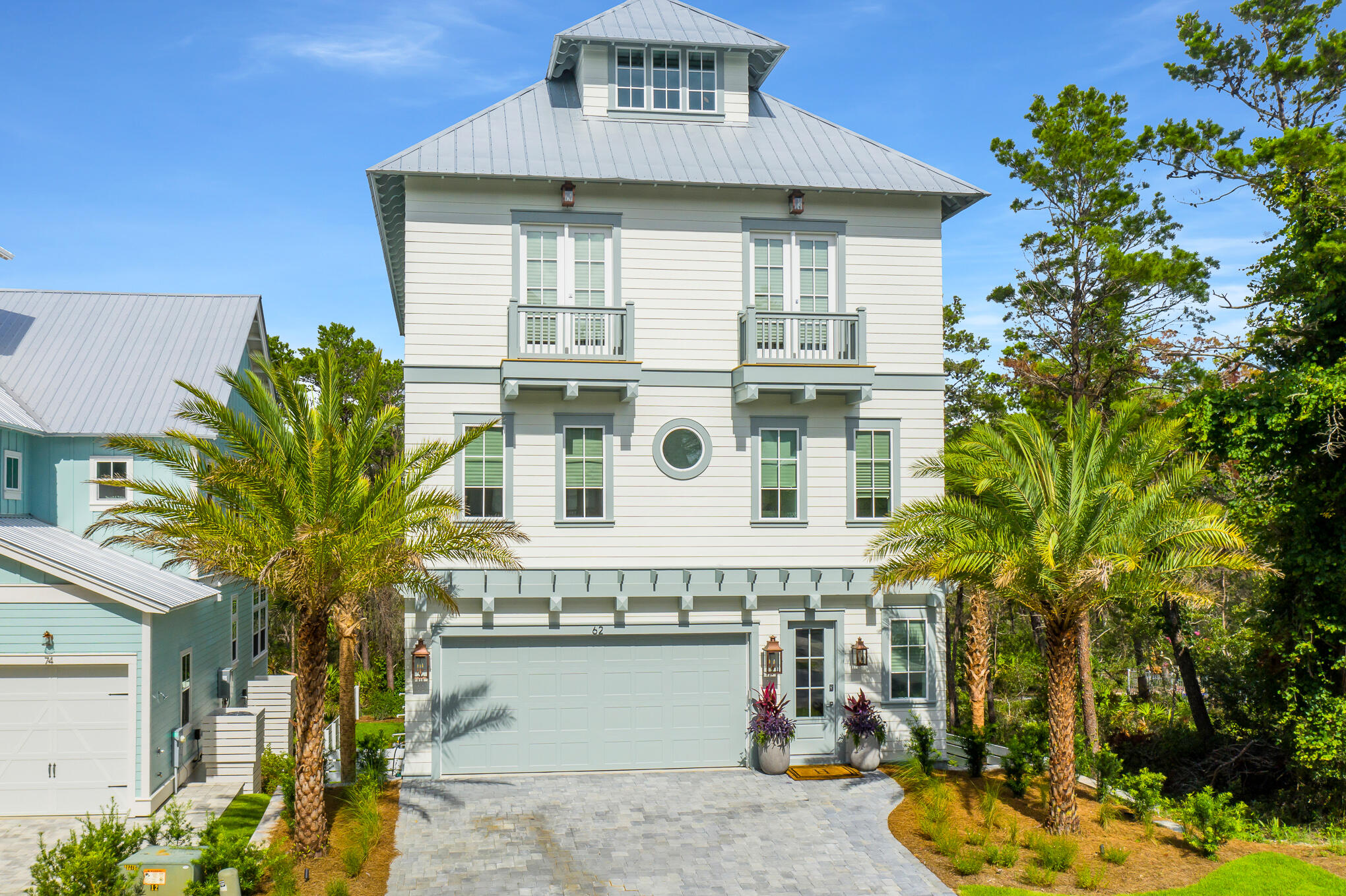 Welcome to 62 Grande Pointe Circle, located in the beautiful community of Grande Pointe in Inlet Beach. This newly constructed home offers over 3700sqft. of living space. This five bedroom, four bathroom home was built for entertainment. Fusing coastal and contemporary styles, this masterfully designed and thoughtfully outfitted residence offers high ceilings, stunning floors, open concept living and unique touches throughout. Looking across the oversized center island to Camp Helen state park, the epicurean in your life will appreciate the oversized range and refrigerator, farmhouse style sink, large pantry and impressive quartz countertops atop custom cabinetry