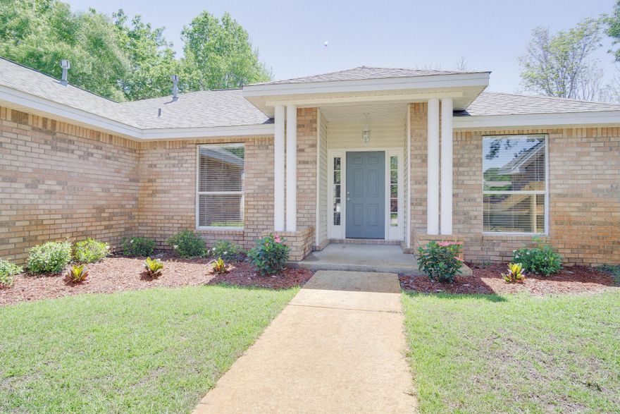 Beautiful and well cared for home on quiet cul-de-sac in Harbor Breeze. New roof in 2016! Open floor plan, wood flooring, vaulted ceilings, formal dining as well as eat in kitchen and wood burning fireplace. The updated kitchen has custom cabinetry, gas stove, granite countertops and stainless appliances. With a perfect split floor plan the master ensuite is completely renovated with a huge, tiled walk-in shower featuring three shower heads. Additionally, you'll find a beautiful double vanity with marble countertops and a large walk-in closet. Relax under the large, all-wood covered porch and enjoy the bonus building in the backyard - perfect for a home office or just about anything! The backyard is privacy fenced and has ample room for a swing set or trampoline for the kids!