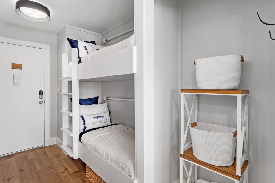 BRAND NEW REMODEL and NO ONE HAS EVER STAYED IN THE UNIT! NEW water heater, all new commercial grade LVP flooring, shiplap throughout, new custom bunks, new kitchen appliances, new quartz counter tops with new under mount sink and garbage disposal. New toilet, vanity, tub with tiled floor and shower! New washer and dryer! All furnishings are new and convey!  Similar canal front units gross over $50k!