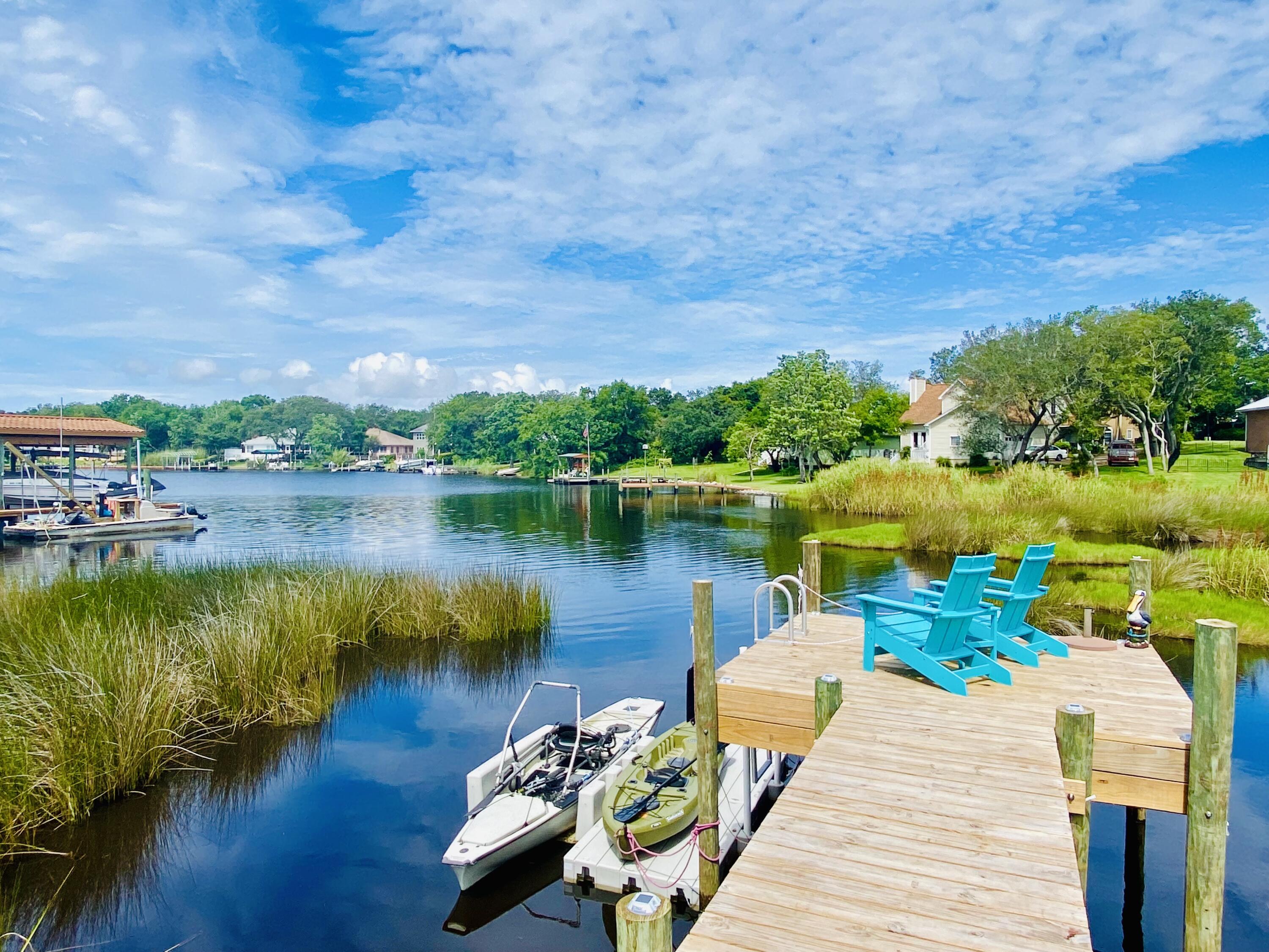 IMMACULATE POOL HOME ALLOWS SHALLOW WATER LAUNCHING SUITABLE FOR KAYAKS, SKIFFS OR JET SKIS for fun & fishing on saltwater Lake Lorraine which opens to Choctawhatchee Bay. Alluring sunsets from the NEW dock await you after a day on the water. The foyer invites you in w/custom tile design & into a sunny living Rm nestled across from a beautifully done renovated kitchen w/custom modern era cabinetry, granite tops/backsplash, with a gas stove to top it off. Spacious breakfast nook area adjacent to the kitchen has large windows for pool/deck views & allows for a sunshine breakfast or casual dinner. Formal dining room is elegant and a perfect place for special dinner guests. Master BR has treyed ceiling w/fan & lg. waterfront window and door that opens to the back deck area. Exquisite...