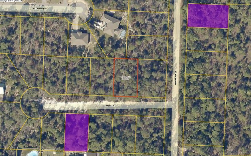 This is a good building lot located on a paved road with utilities available. There is a public boat ramp and access to the Santa Rosa Sound nearby.