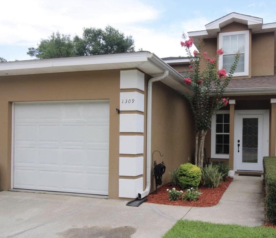Welcome to Treasure Cove in Bluewater Bay. This freshly painted home features oversized bedrooms upstairs with walk in closets. The master bedroom downstairs also features a large closet, double vanities in bathroom, & walk in shower. Kitchen has newer stainless steel appliances, 2014 AC, New Roof, spacious living room with new flooring, lovely back patio, one car garage, and more! Schedule your walkthrough today!(Seller will provide carpet allowance with reasonable offer).
