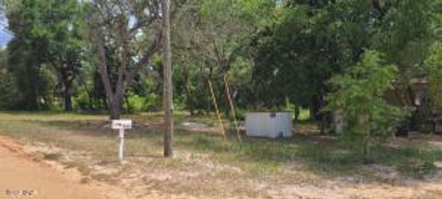 This lot is located just south from the new Margaritaville Community located on Hwy 79. This area is tucked south of the Intercoastal Bridge and possible waterview across the street with a multi story home. There is a current mobile home on the property but the listings value is in the land.