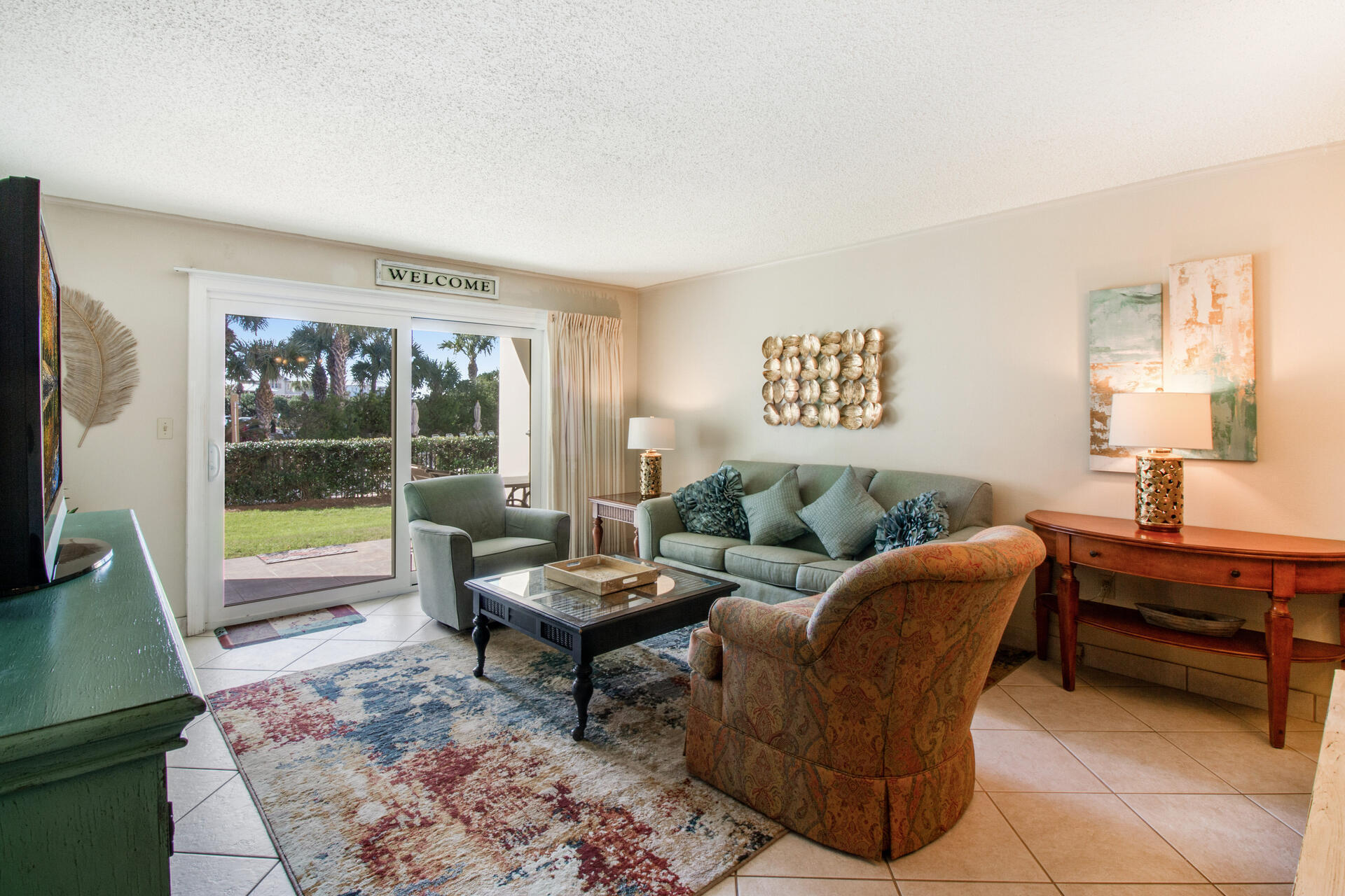 From this ground-level 2Br/2Ba Islander condo you and your guests can enjoy your 'beach cottage' with the lawn and pool right in front of the unit. The Islander is a highly popular beachfront vacation rentals building of 127 2Br/2Ba units with two pools and hot tubs. To walk onto the beach you do walk across a driveway that goes to the adjacent neighbor building. Short walk on the beach to enjoy snorkeling or fishing at spots along the East Pass east jetty ... Buyer may be required to honor upcoming vacation rental bookings that cannot be moved to another unit.