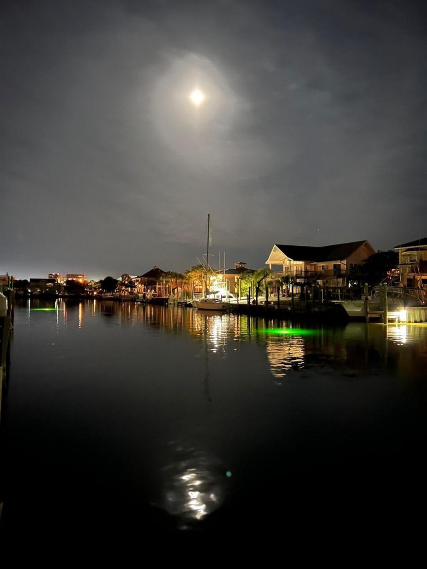 WALK TO THE BEACH OR BOAT TO THE GULF. ONLY 3 BLOCKS TO BEACH AND A FEW MINUTES BY BOAT TO THE PASS. 3 BOAT SLIPS PLUS AN ADDITIONAL 48 FT. SEA-WALL.