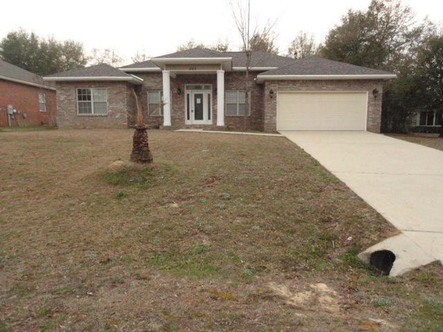 REO...Renovated with new roof, appliances, carpet and fresh paint. This 4/3 open floor plan home with split bedroom design is all brick with vinyl trim. A large front porch welcomes you into the great room. The master suite has sliding doors leading to the covered rear porch. The master bath has dual vanities, jacuzzi tub and separate shower. The 3rd bathroom has a shower only. A nice covered patio overlooking the back yard. The rear yard has a natural vegetation for privacy. The yard also features a irrigation system. See attachment for PAS requirements and WFHM offer submittal information in MLS document section.