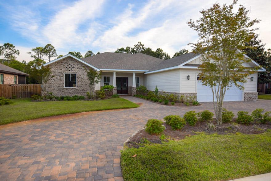 Brand New 4 Bedroom 4 Bath Home loaded with upgrades! The interior of the home features beautiful wood floors in the kitchen and main living area, GE Cafe stainless appliances, Designer light fixtures, All wood custom cabinets, Marble counter tops throughout, lots of built ins and large wood burning fireplace. The Large master bedroom has walk in closets with custom wooden built ins. The master bath features Porcelain tile, Aerator tub and a separate walk in shower with designer tile and frameless glass door. On the opposite side of the home are three guest bedrooms and baths. One of the baths can also be accessed from the large back yard in case the new owner would like to add a pool. The outside of the home features Hardi and Brick siding, Privacy fenced back yard, Circular paver driveway, and an irrigation system.