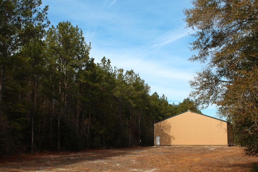 Attention hunters, fishermen, & nature enthusiasts! This property has it all! 51 wooded acres in Eastern Walton County. Big deer country. The owner built a 3600 S.F. custom metal warehouse on concrete slab with 18 foot eaves, two commercial grade roll up doors, 200 amp power and a deep well. The building cannot be seen from the road. Also on the property is a mobile home site with power pole, septic & well. ( seller cannot verify the condition of the septic or well). The subject property is located Less than 3/4 of a mile from a Choctahatchee River public boat ramp. This location offers easy access to Panama City Int'l Airport and Panama City Beach. Shown by appointment. Listing agent must accompany. Buyer firm on pirce