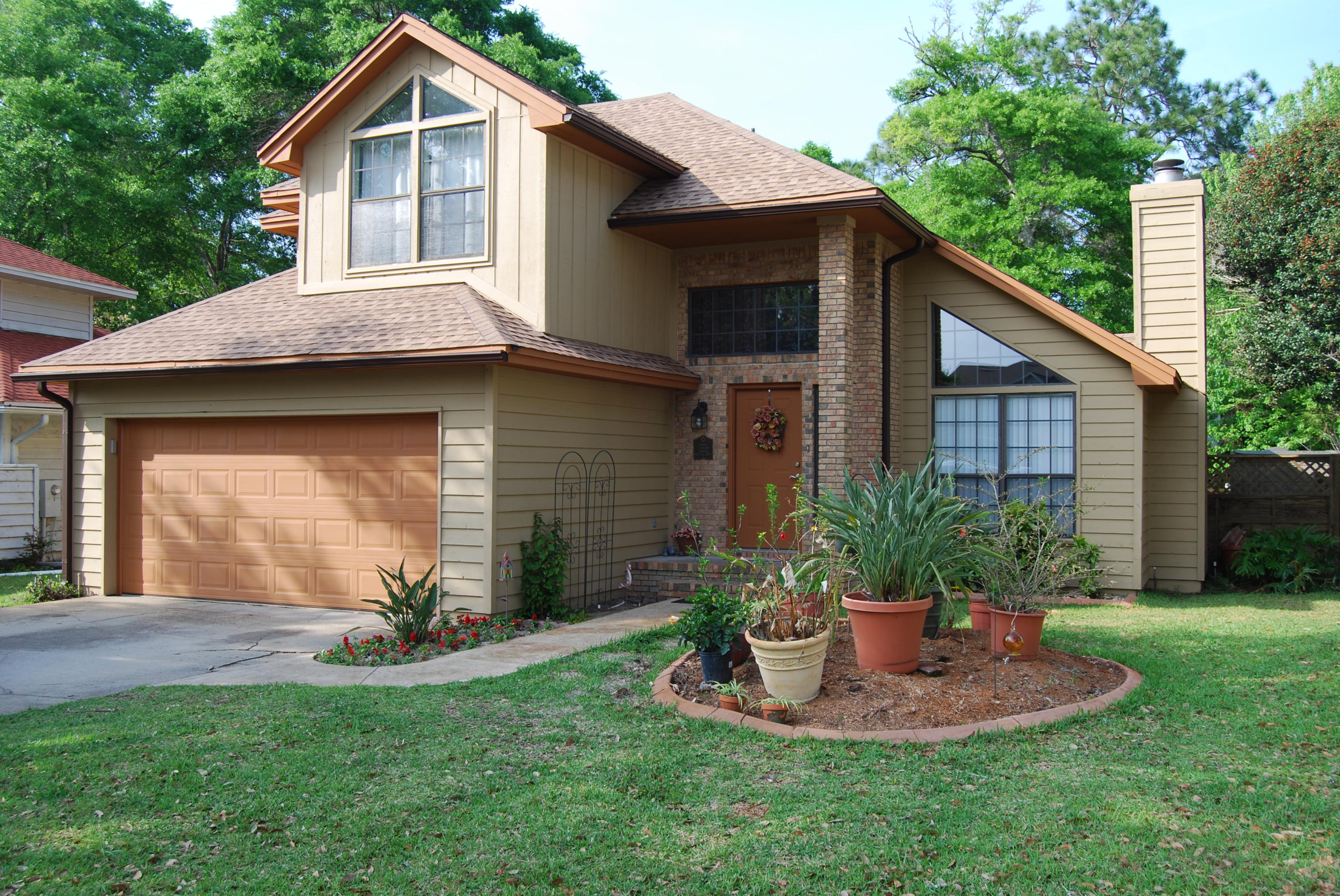 Beautiful Home in Fort Walton Beach close to the Hospital and even better, it's on a cul-de-sac street. When you walk in the home you are greeted with beautiful cherry hardwood floors an open great room with a gas burning fireplace and high vaulted ceiling. Kitchen has been upgraded with newer cabinets, granite counter tops all stainless steel appliances and a breakfast bar. Master suite with an updated master bath with a large walk in closet, double vanities and a large shower. Upstairs features a great loft/office area, two bedrooms with walk-in closets and a full bath. There is a new open deck out back with plenty of room for grilling, relaxing and entertaining your guests. The backyard has plenty of room for a play set and it's enclosed with a privacy fence.