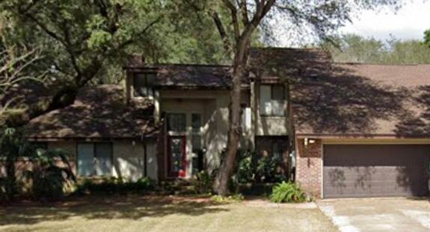 Barton home looks brand new! living room with high ceilings and built-in bookcases;  family room open to the kitchen; loft; and a 222 SF sun room (not counted in our SF)! Large screened -in pavered area with Spool.