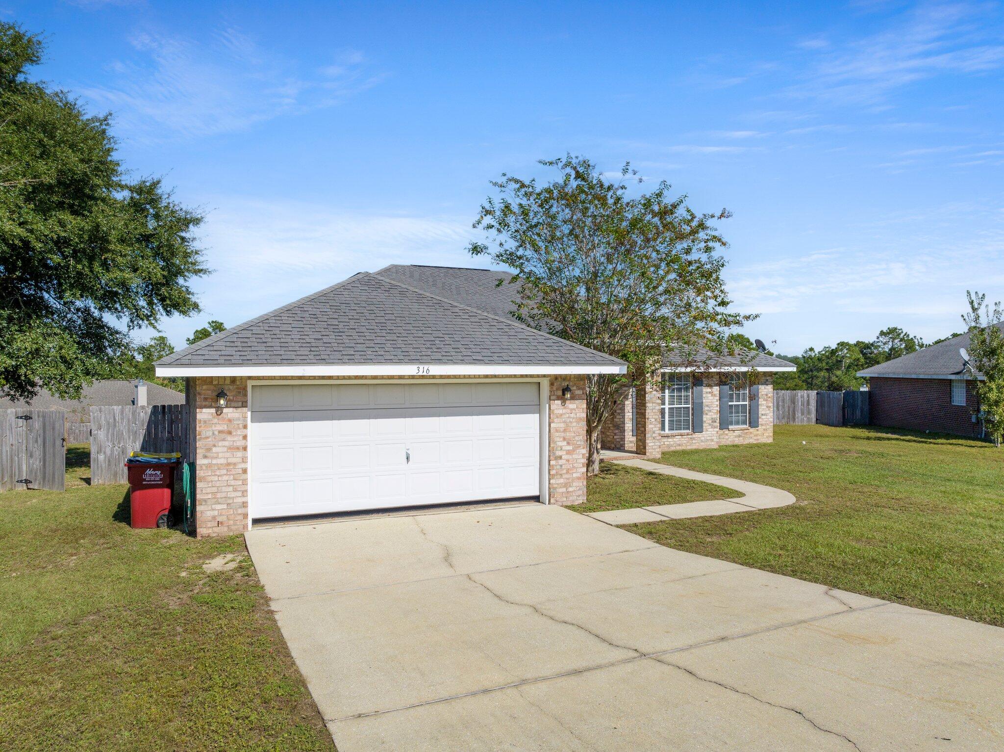 Spacious 4-Bedroom Home in Alicia Place, South CrestviewWelcome to this charming brick home offering over 2,500 sqft of comfortable living space, perfectly situated on a large lot in south Crestview. Enjoy the convenience of a short commute to beaches, military bases, schools, shopping, and dining, while living in the quaint and welcoming Alicia Place community.This beautiful home features four bedrooms and two full bathrooms, with a split floor plan that provides added privacy. Vaulted ceilings and neutral paint throughout create an airy and inviting atmosphere and carpeting is reserved for the bedrooms to add warmth and comfort. The spacious living room is ideal for both relaxation and entertaining, while the eat-in kitchen offers a breakfast bar, pantry, and plenty of cabinet and counter space for all your culinary needs. For more formal occasions, there is a separate dining room, as well as an office/flex space to accommodate your lifestyle needs.

The primary suite serves as a peaceful retreat with a garden tub, walk-in shower, dual walk-in closets, a double vanity, and a separate toilet room. The two guest bedrooms are generously sized and share a full guest bath. Laundry hookups are conveniently located in the laundry room off the 2-car garage. Outside, the large privacy-fenced backyard provides ample space for outdoor activities and leisure.

Pets may be considered on a case-by-case basis with prior owner approval and a non-refundable pet fee. No smoking or vaping is permitted on the property.
