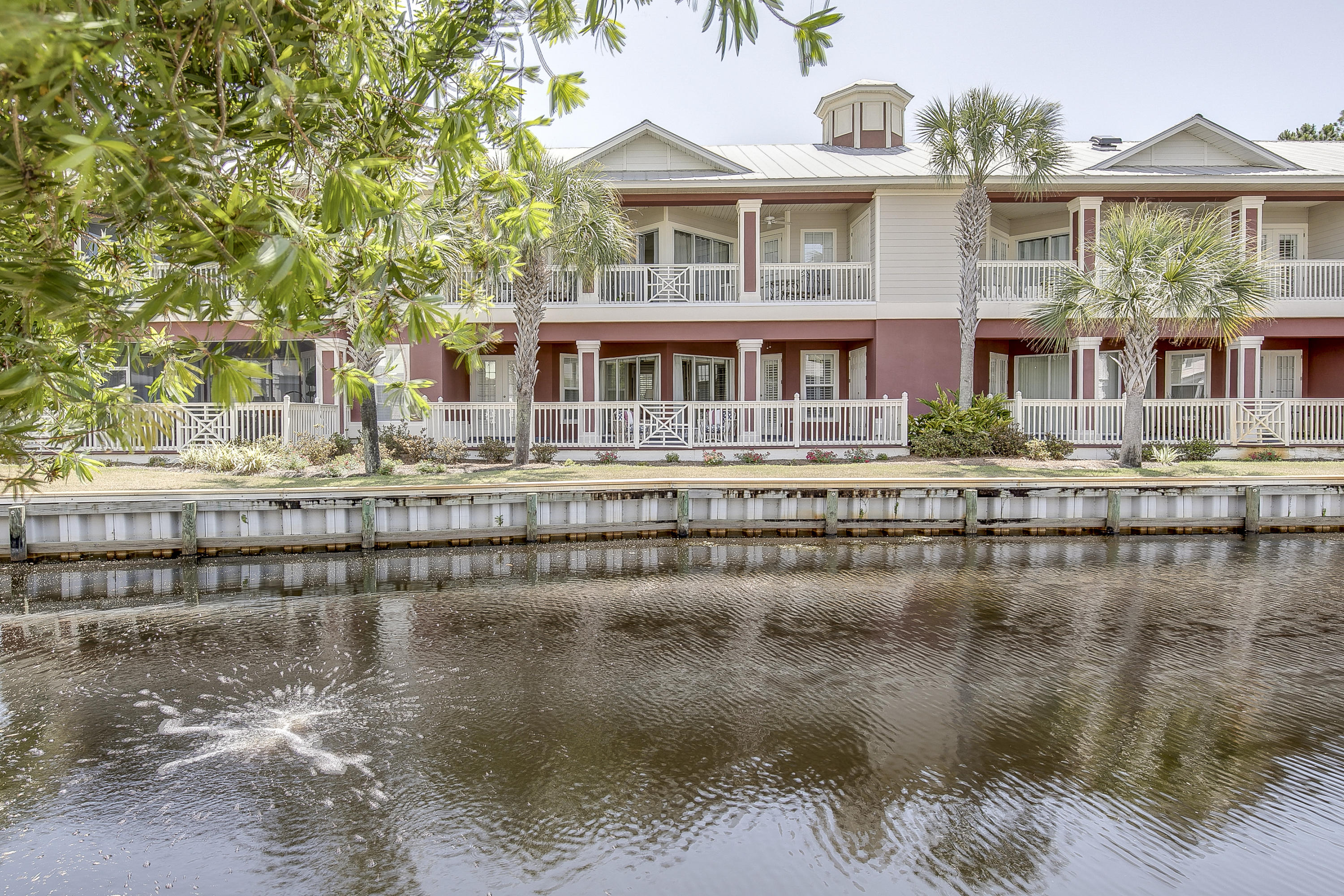 Crystal Cove is a best kept secret in Sandestin with its low traffic, cul-de-sac location. This well maintained 1BR/1BA condo on the 1st Floor & is the largest one-bedroom unit (881 sq ft) in Sandestin and is being sold fully furnished. Condo comes with an assigned parking space (20 feet from the front door) and there is overflow parking available. Excellent location for permanent living or as a vacation/rental home located on a canal front with a lake view. The floor plan is open and has an over-sized patio with sliding glass doors and French doors that bring the outdoors right into the home. This condo has 10-foot ceilings, 8-foot doors, tray ceilings with crown molding. The unit sleeps four with a Queen size bed in the master suite and a sofa sleeper in the main living area.
