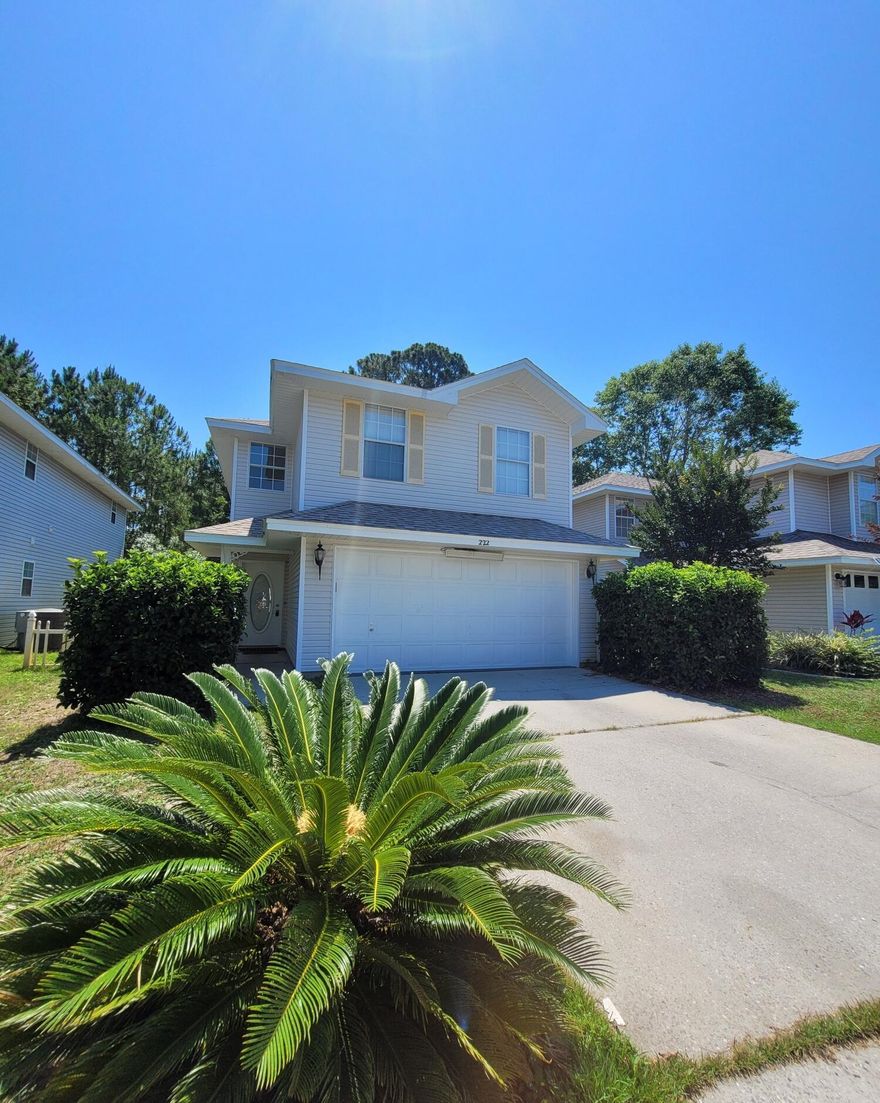 Welcome home! Large two story contemporary style 3 bedroom 2.5 bath home for sale in the desirable Twin Lakes subdivision of Destin. Just minutes from shopping, dining, and beaches. Large open living room with beautiful fireplace and tall ceilings. Large dining area, plus breakfast bar off of the kitchen. Spacious kitchen with ample countertop space. Stainless steel appliances. Half bath located downstairs. Upstairs you will find three bedrooms, 2 full baths, plus a large secondary living space just off the landing, perfect for a playroom for the kids or an office area. Large master suite with double vanity. Adorable back yard.  Come take a look at this beautiful property today!