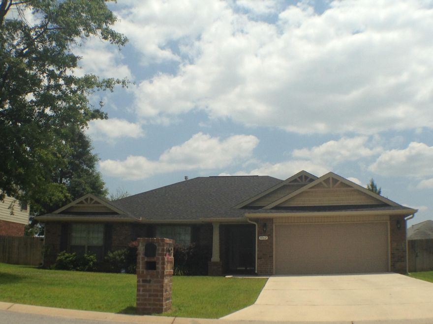 This home is located just 5 miles from I-10 in Crestview, and you dont want to miss seeing it! It is a spacious Four bedroom, two and a half bath home with numerous updates, and improvements. Once inside, the foyer flows past the half bath on your right into the great room with a vaulted ceiling that is perfect for large gatherings or parties. The great room also enjoys direct access onto a large covered back patio that is perfect for enjoying the outdoors rain or shine. The Spacious kitchen boasts stainless steel appliances, granite countertops, newly updated pack splash and a oversized pantry/laundry room.Down the hallway toward the bedrooms, the Master suite has two large walk in closets, large bedroom, dual vanities as well as oversized corner garden tub and a separate separate