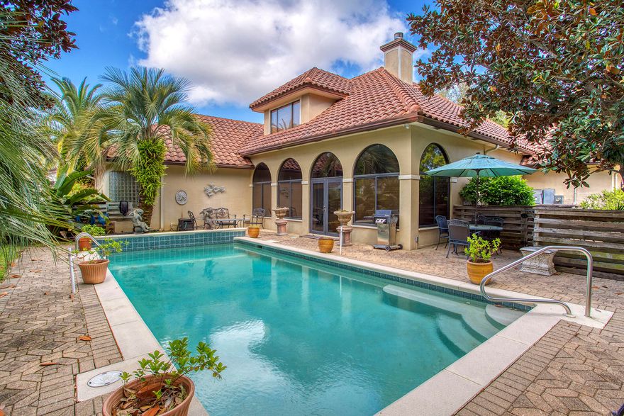 Welcome to Baytowne at its finest! This lovely Sandestin estate is nestled among oak trees and features lush landscaping. The kitchen has recently been updated and there is a beautiful heated pool in your backyard oasis. Stroll to one of the resort's owner pools, the Village of Baytowne Wharf or hop in your private golf cart  and hit up all that Grand Boulevard has to offer! Don't miss the opportunity to own your dream home.