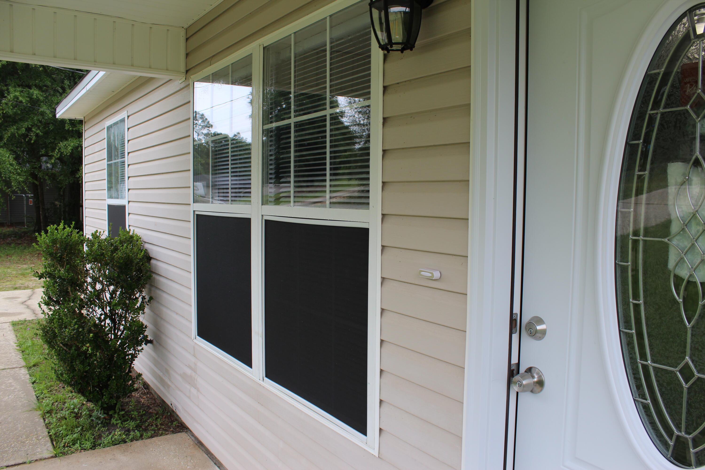 Come see this stunningly renovated home featuring a split floor plan on a large, cleared lot, and located in a serene and peaceful neighborhood just North of downtown Crestview! This three bedroom, two bath home has had a complete remodel from top to bottom in 2023 to include a brand new roof, stainless steel appliances, LVP flooring, fixtures, kitchen counters, toilets, neutral paint, exterior doors, and so much more! In the living area, enjoy large windows and vaulted ceilings to make the space feel large and bright. The master bedroom features a walk-in closet and nice en-suite bath with shower/tub combo and privacy from the other two bedrooms. The property sits on 1/2 an acre, allowing for plenty of space in the backyard for activities, a large garden, or just extra space to enjoy!