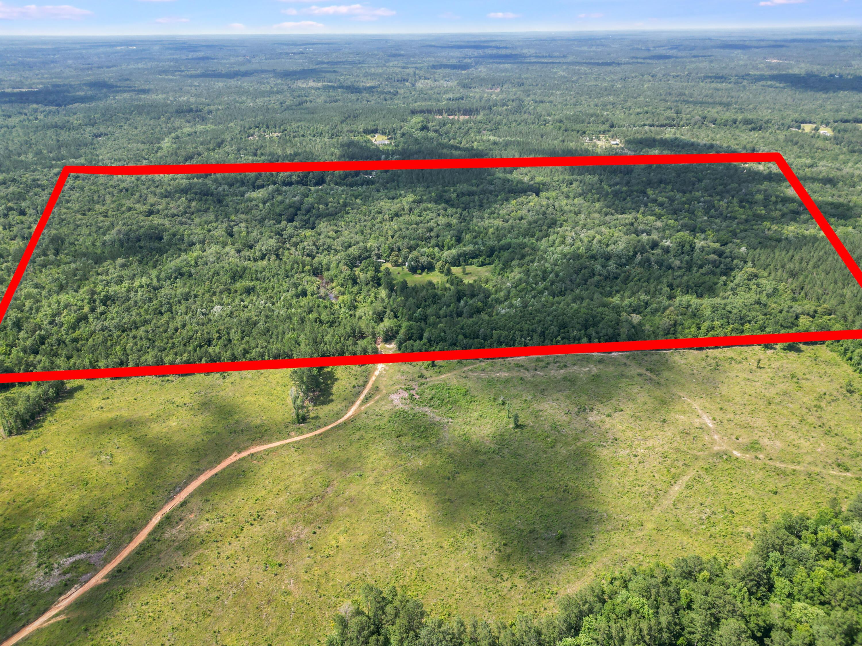 5acre parcel and 78 acre parcel = 83 acres with home composed of 2 parcelsHome year built 2001 3/2 currently does not have documented  easement established.