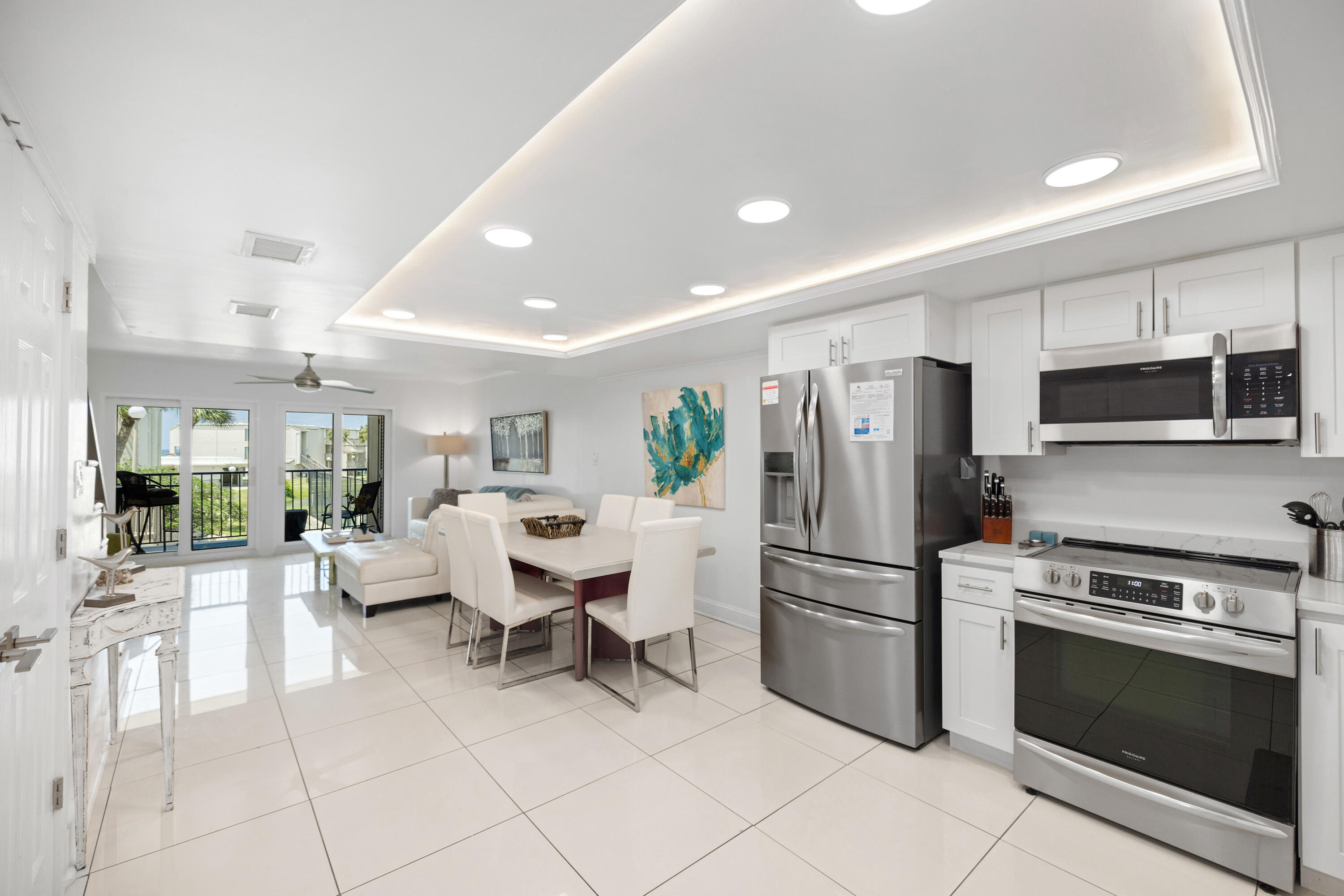 Welcome to Sugar Beach Unit A14, your Gulf-view haven that blends coastal allure with modern luxury. This 1,750 sq/ft gem offers four bedrooms and three full baths. The unit is meticulously remodeled and boasts custom ceilings, pristine marble, and wood-look tile floors. The three full bathrooms feature exquisite tiled showers, each providing a spa-like retreat. The open floor plan seamlessly blends the living, dining, and kitchen areas to create a spacious, inviting atmosphere. The kitchen is a chef's dream, boasting new cabinets, quartz countertops, and top-of-the-line stainless steel appliances. Beyond interior elegance, the entire complex has undergone a comprehensive restoration, featuring fresh exterior painting, new sliding doors and windows, and updated balcony coatings and railings, ensuring a modern and pristine aesthetic throughout.
Sugar Beach is a gated community, ensuring security and abundant recreational amenities. Enjoy direct beach access, a community pool, and sports like tennis or pickleball. Explore lush grounds with a koi and turtle pond, a serene escape. Nearby entertainment and restaurants offer endless exploration.
Fully furnished and turn-key ready, this condo is an exceptional opportunity for investors and those seeking a beachfront lifestyle. With excellent income potential, it's a dream for both. Take advantage of experiencing coastal living at its finest.