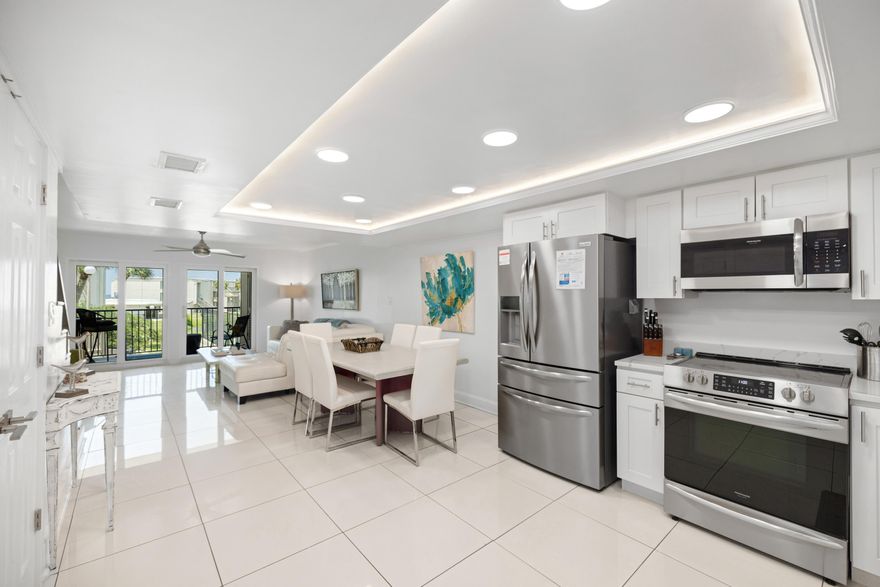 Welcome to Sugar Beach Unit A14, your Gulf-view haven that blends coastal allure with modern luxury. This 1,750 sq/ft gem offers four bedrooms and three full baths. The unit is meticulously remodeled and boasts custom ceilings, pristine marble, and wood-look tile floors. The three full bathrooms feature exquisite tiled showers, each providing a spa-like retreat. The open floor plan seamlessly blends the living, dining, and kitchen areas to create a spacious, inviting atmosphere. The kitchen is a chef's dream, boasting new cabinets, quartz countertops, and top-of-the-line stainless steel appliances. Beyond interior elegance, the entire complex has undergone a comprehensive restoration, featuring fresh exterior painting, new sliding doors and windows, and updated balcony coatings and railings, ensuring a modern and pristine aesthetic throughout.

Sugar Beach is a gated community, ensuring security and abundant recreational amenities. Enjoy direct beach access, a community pool, and sports like tennis or pickleball. Explore lush grounds with a koi and turtle pond, a serene escape. Nearby entertainment and restaurants offer endless exploration.

Fully furnished and turn-key ready, this condo is an exceptional opportunity for investors and those seeking a beachfront lifestyle. With excellent income potential, it's a dream for both. Take advantage of experiencing coastal living at its finest.