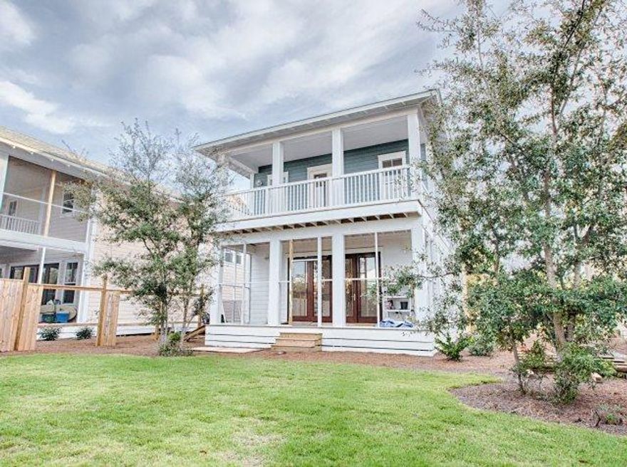 This two story approximately 2,335 square feet home includes 4 bedrooms and 3.5 baths. Located in Village of Sugar Beach right in the heart of Seagrove Beach just two lots from the community pool and steps to beach access. This open floor plan home offers optimal use of space for indoor and outdoor entertaining with a 12' NanaWall expanding the indoor living outto the substantial back yard. Fully fenced in backyard with room for a pool! The interiorfeatures high end finishes, maple wood floors throughout, 10' ceilings on both levels, granite and quartz countertops in kitchen and baths and stainless steel appliances. The oversized living area, kitchen, dining, half bath and master suite with private bath are situated on the first level. The second level features a master bedroom