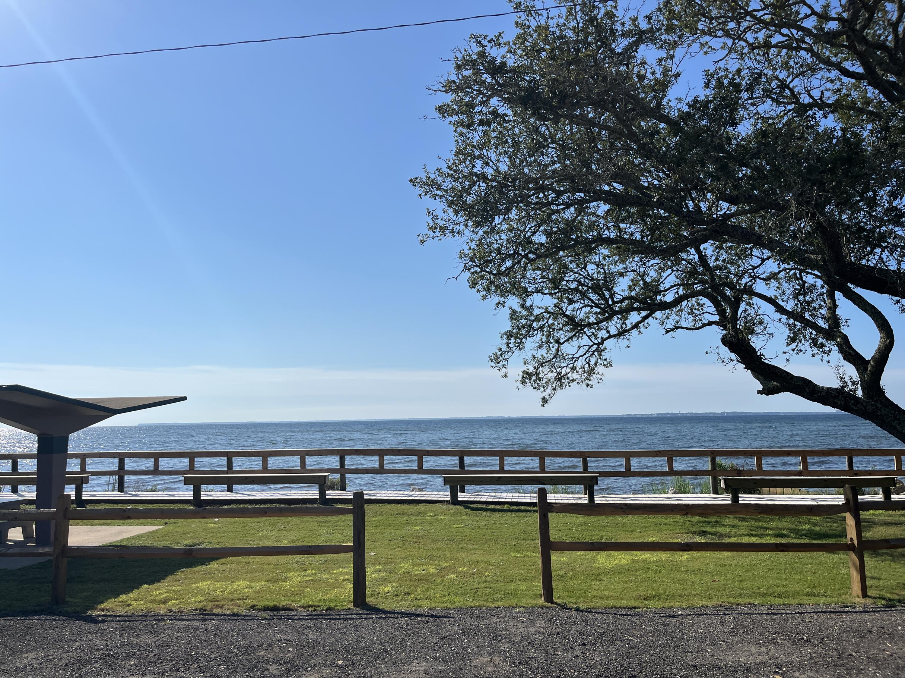 Build your dream home on this spacious .53-acre lot offering sweeping bay views and  privacy. This lot combines natural beauty with convenience--quick drive to beaches, bay access and local dining, yet tucked away from the crowds.Whether you're building a weekend getaway or your forever home, this property offers so much! Picture morning coffee with the sunrise over the bay, evenings watching dolphins play, and all the peace you've been craving.Bring your builder and your vision--this is Florida living at its finest. This lot is a rare find for those seeking tranquility with a view.