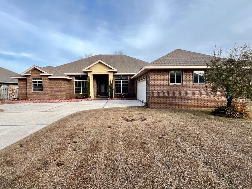 This is the home you've always wanted: a four-bedroom, three-bath executive house in a gated, waterfront community.  Located in the last peaceful part of Florida's Emerald Coast, this nearly 3000 square foot home, with its high ceilings and generous windows, feels as spacious as a palace.  The centerpiece of the home is the open plan kitchen, with stainless steel appliances, smooth cooktop, granite countertops, and a generous island with a separate sink for preparing meals.  The home features upgraded architectural elements such as numerous arches and pillars, an eye-catching coffered ceiling, recessed lighting, large baseboards and crown molding.  The living room is dominated by the wood burning fireplace.  An office and a dining room are on either side of the main entrance. Most of the floors are travertine, with new, cozy carpeting in the bedrooms.  There's an oversize garage with an epoxy coated floor.  The back of the house is dominated by a covered back porch and a fenced backyard.

Heritage Park is a gated community located on the Santa Rosa Sound. Homeowners enter over a cobbled street and enjoy curbs and sidewalks, underground utilities, and a waterfront clubhouse. That's where you'll find an in-ground salt-water pool with the best views of the Sound, a gym, conference room, TV lounge, a full kitchen and deeded access to the beach so you go boating, fishing, or see the sunsets. The city of Navarre is away from the tourist areas but still close to the great shopping and medical facilities of Gulf Breeze, Pensacola, and Fort Walton Beach.  You are only minutes away from the restaurants and entertainments of Destin.  

Buyer to verify all dimensions and information.
