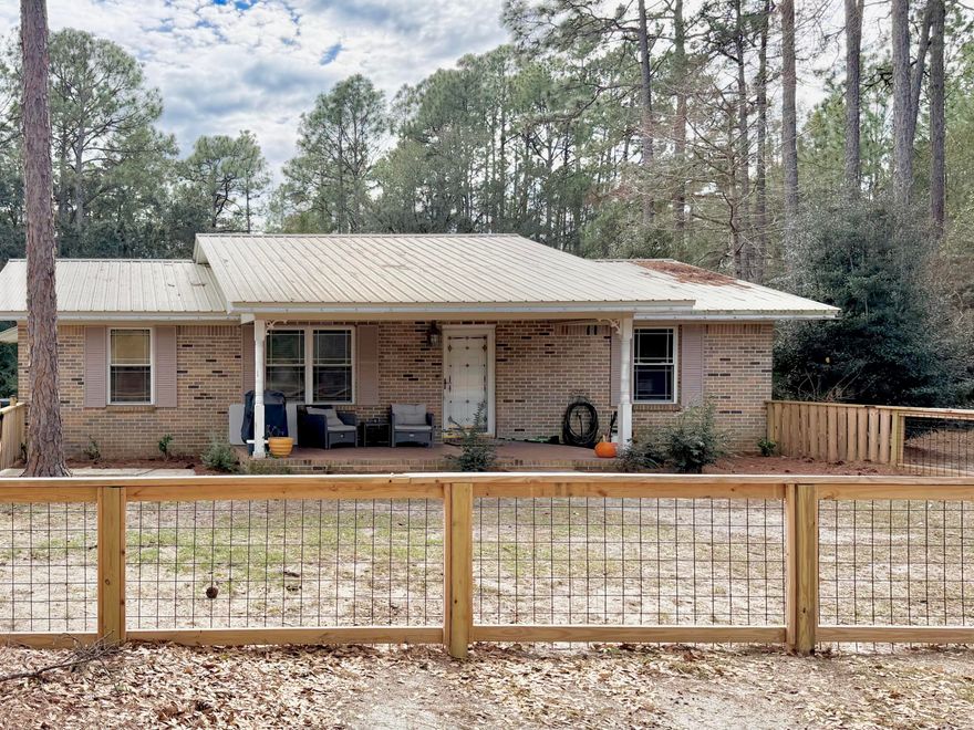 3 Bed, 1 1/2 Bath Brick  home on large lot. Interior has tiled floors and fresh interior paint throughout. Covered front porch and fenced in front yard creates an outdoor space to enjoy. Large back yard with shed for extra storage. Credit check required required upon application, $50 non-refundable application fee applies. Call 803-448-7025 for more information.