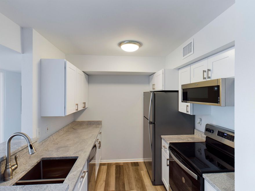 2nd floor condominium at Indian Lake ,  With new light at restraunt row , it is now just a short walk (.5 Miles)to beach at June Decker park with access, showers and restrooms. Short term rentals allowed. This condominium has been updated with getting rid of popcorn ceilings, new paint ,  wood look lvp floors, new cabinets in kitchen with soft close  dorrs and drawers, new vanitiies in the baths, granite counters in kitchen and baths. Stainless applainces in the kitchen and new washer dryer.. New light fixtures and ceiling fans.  Indian Lake amenities include a pool, gym, & picnic area. Just a short walk to the dog park and a short walk to the beach,.