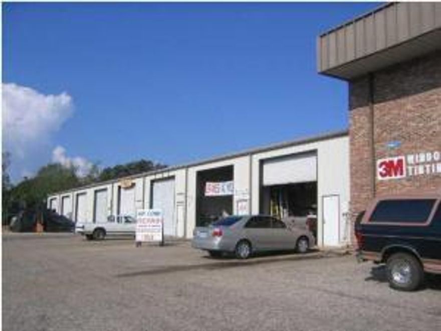 Warehouse space available 1300 sq ft, has large rollup bay door.