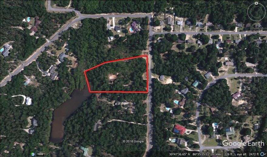 4.38 AC Lakefront Homesite with a stream on the property. This lot has a Beautiful view of the lake, and is wooded with mature trees. What a private, natural setting for a dream home. Make your offer and let your dream begin.