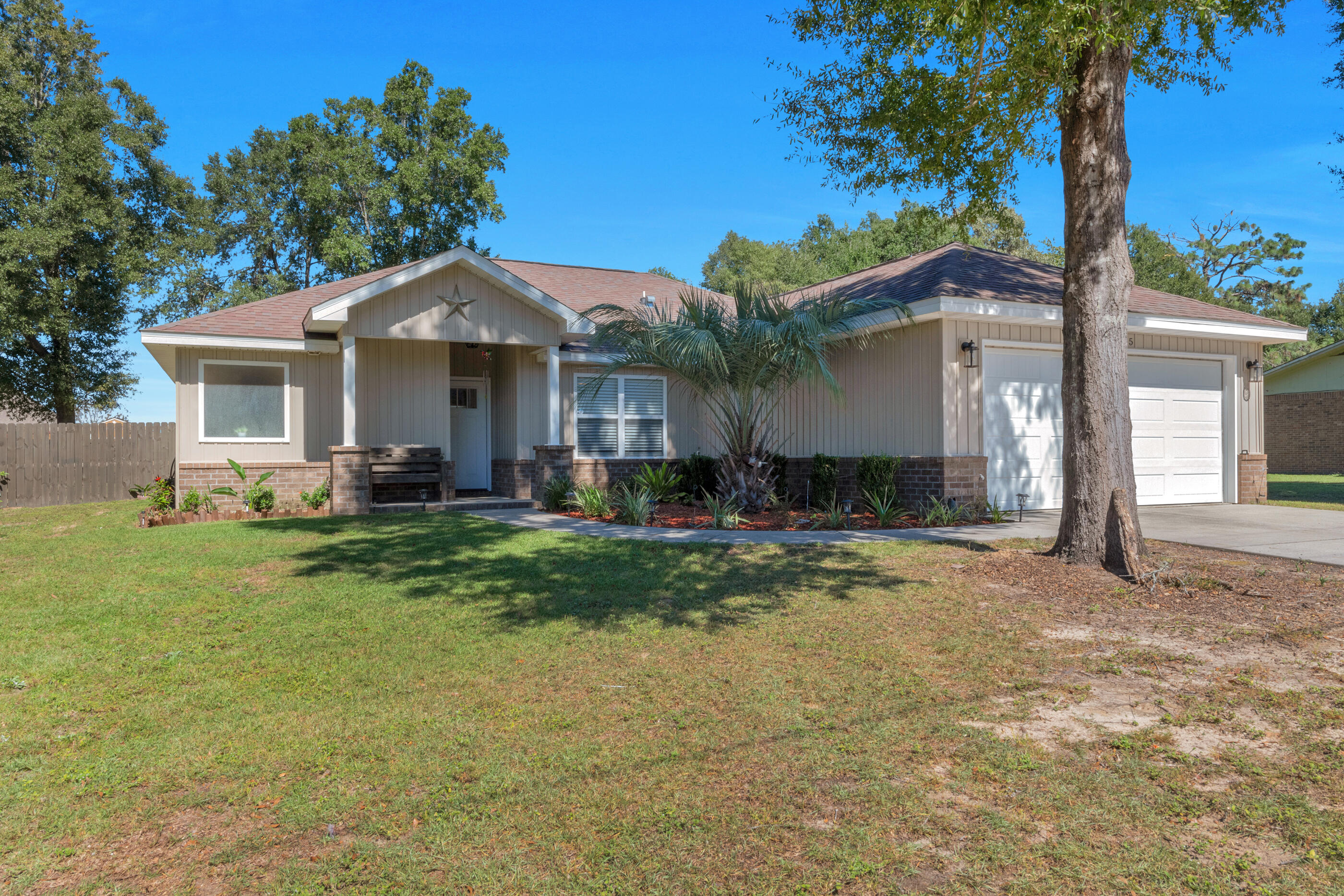 This stunning 4-bedroom, 2-bathroom Linc Grant home is move-in ready and offers exceptional space and comfort on a large, flat, fully fenced lot. Impeccably maintained, the well-thought-out split floor plan provides the perfect balance of privacy and convenience.The kitchen boasts stainless steel appliances, a smooth top range, and an open concept design, ideal for entertaining. Mohawk Luxury Vinyl Tile flooring runs throughout the living room, kitchen, and bathrooms, offering style and easy maintenance. The spacious living room features vaulted ceilings, making the home feel even larger than its stated square footage. All bedrooms are equipped with upgraded carpet, providing extra durability and comfort. With a generous eat-in dining area and plenty of natural light, this home is perfect for families or anyone seeking a blend of elegance and practicality. Don't miss this opportunity to own a beautiful home in a fantastic location!